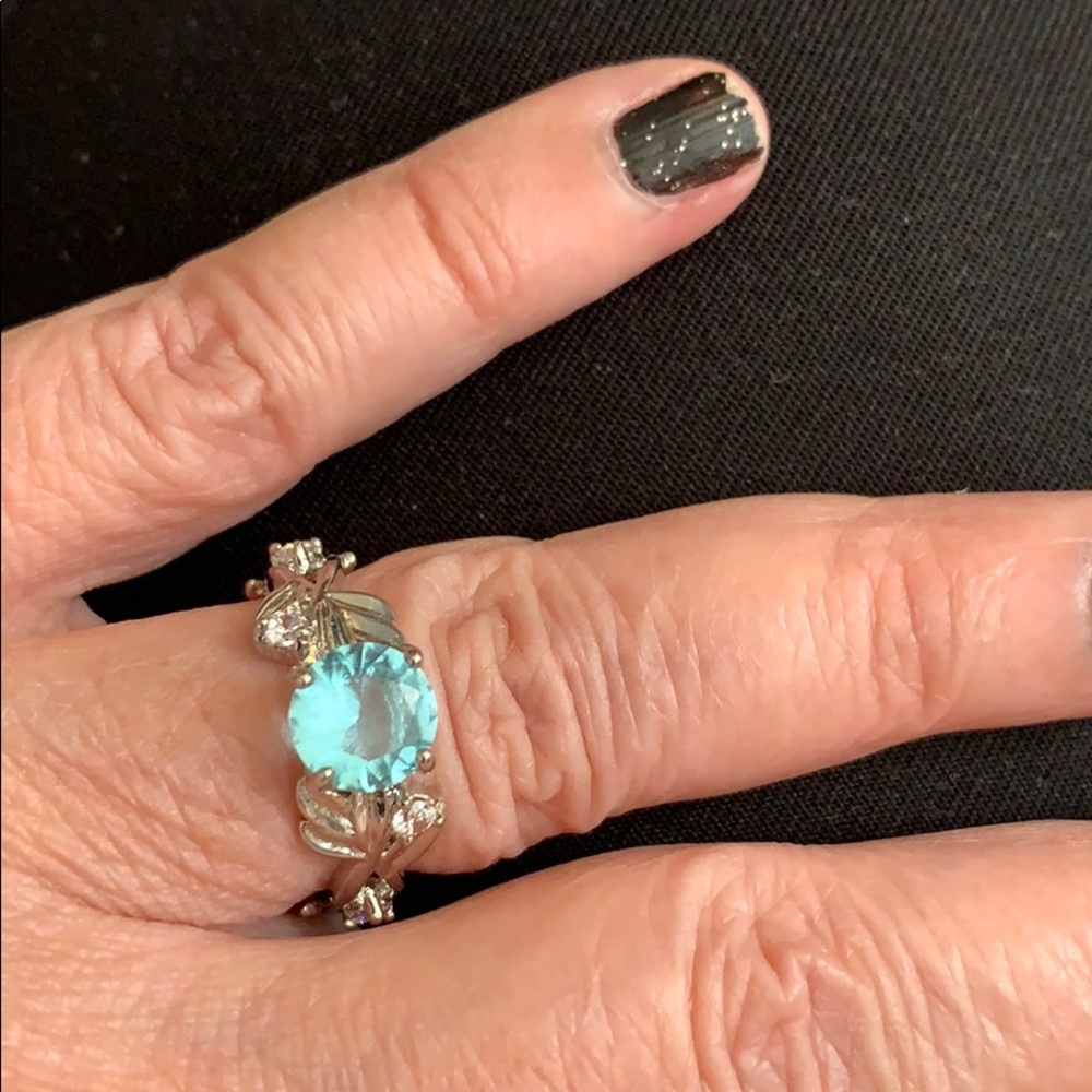 Sterling silver adorable blue stone ring.